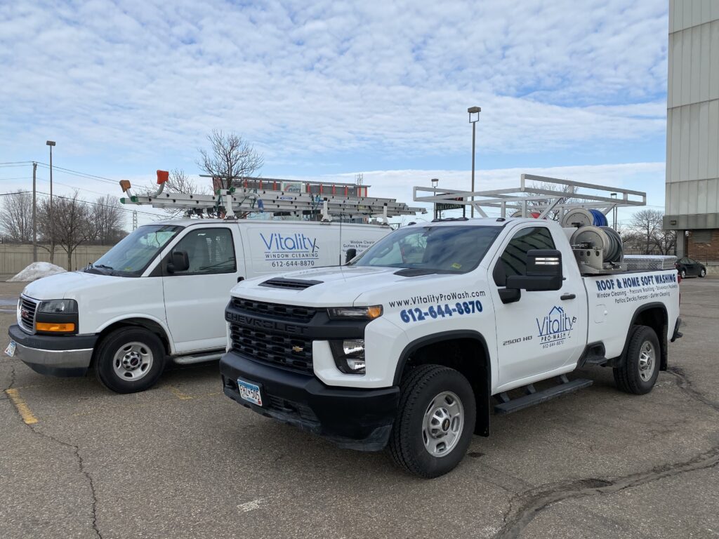 Vitality roof & home soft washing trucks in Minneapolis, MN